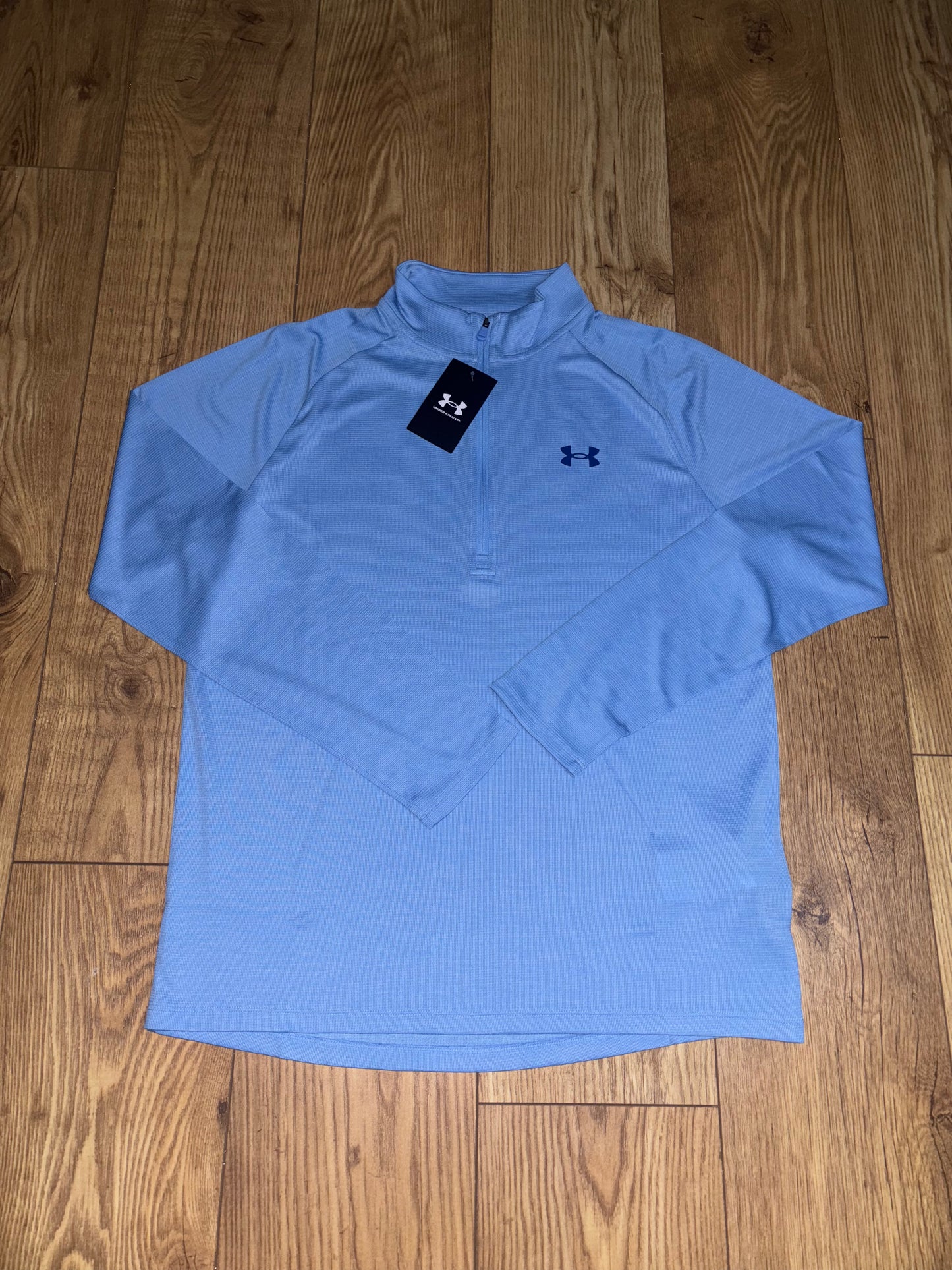 Under Armour 1/4 Zip. Size M/L/XL