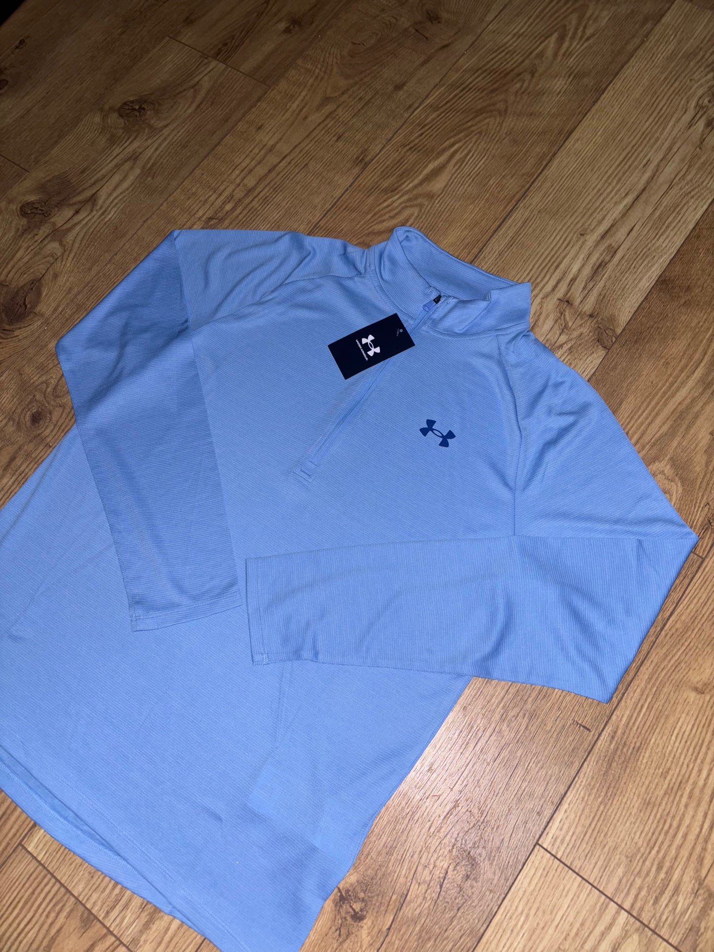 Under Armour 1/4 Zip. Size M/L/XL